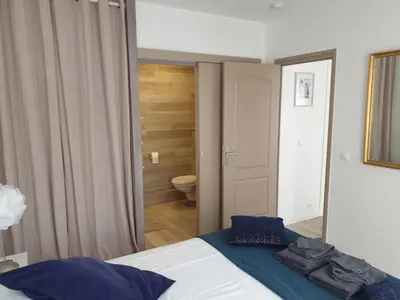 Un ou plusieurs lits dans un hébergement de l'établissement cosy appartment - Clamart Percy Paris