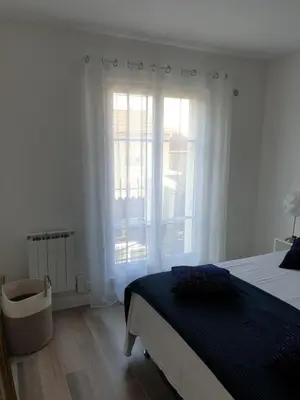 Un ou plusieurs lits dans un hébergement de l'établissement cosy appartment - Clamart Percy Paris