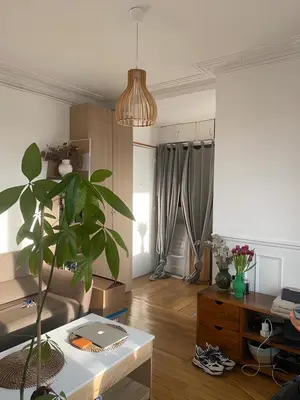 Coin salon dans l'établissement Appartement ensoleillé, central et tout équipé avec vue Tour Eiffel et Panthéon
