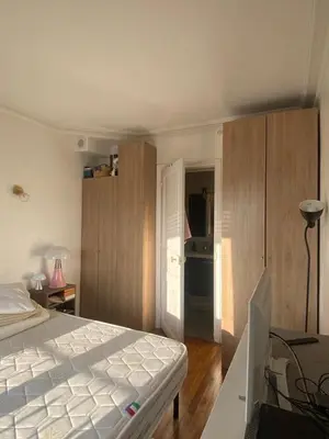 Un ou plusieurs lits dans un hébergement de l'établissement Appartement ensoleillé, central et tout équipé avec vue Tour Eiffel et Panthéon