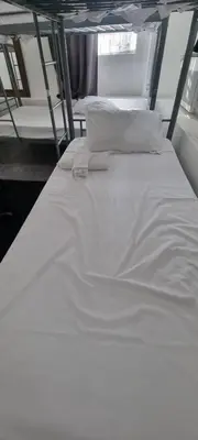 Un ou plusieurs lits dans un hébergement de l'établissement Hotel Aboukir