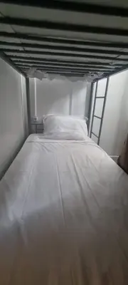 Un ou plusieurs lits dans un hébergement de l'établissement Hotel Aboukir
