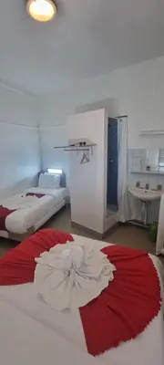 Un ou plusieurs lits dans un hébergement de l'établissement Hotel Aboukir