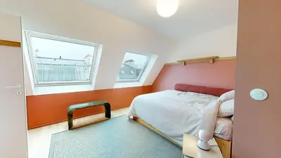 Un ou plusieurs lits dans un hébergement de l'établissement JOIVY Premium flats in the heart of the 9th arr, near Moulin Rouge