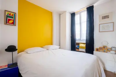 Un ou plusieurs lits dans un hébergement de l'établissement Veeve - Montmartre Majestique