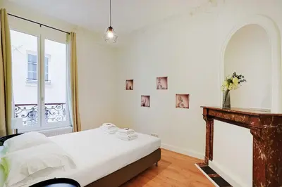 Un ou plusieurs lits dans un hébergement de l'établissement Magnificent flat - 3BR-8P - Montorgueil