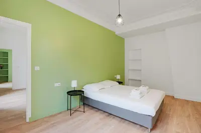 Un ou plusieurs lits dans un hébergement de l'établissement Magnificent flat - 3BR-8P - Montorgueil