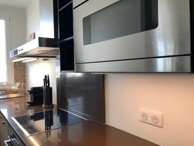 Cuisine ou kitchenette dans l'établissement LuxAppart-Paris