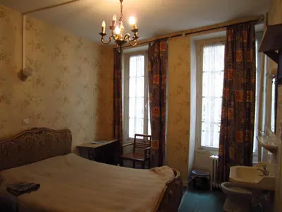 Un ou plusieurs lits dans un hébergement de l'établissement Hotel d'Orléans Paris Gare de l'Est