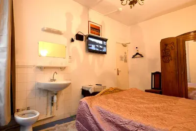 Un ou plusieurs lits dans un hébergement de l'établissement Hotel d'Orléans Paris Gare de l'Est