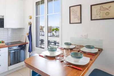 Cuisine ou kitchenette dans l'établissement Appartement Lottin - Welkeys