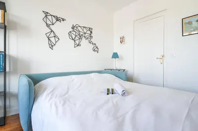 Un ou plusieurs lits dans un hébergement de l'établissement Appartement Lottin - Welkeys