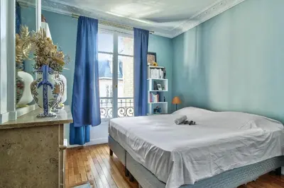 Un ou plusieurs lits dans un hébergement de l'établissement Appartement Chernoviz - Welkeys