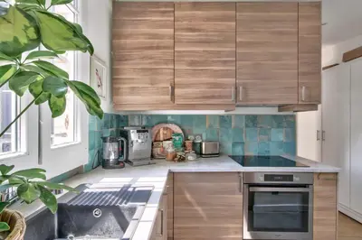 Cuisine ou kitchenette dans l'établissement Appartement Chernoviz - Welkeys