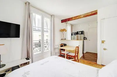 Un ou plusieurs lits dans un hébergement de l'établissement INVALIDES - TOUR EIFFEL