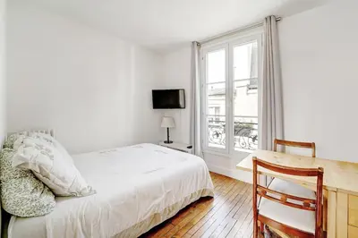 Un ou plusieurs lits dans un hébergement de l'établissement INVALIDES - TOUR EIFFEL