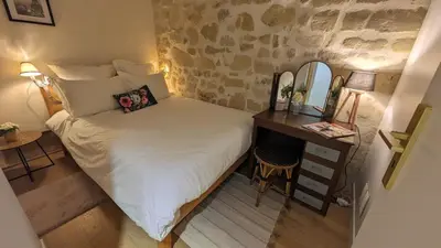 Un ou plusieurs lits dans un hébergement de l'établissement Les Frères Montgolfier - Le Marais - 80 m2