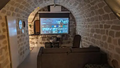 Télévision ou salle de divertissement dans l'établissement Les Frères Montgolfier - Le Marais - 80 m2