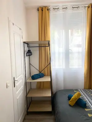 Un ou plusieurs lits dans un hébergement de l'établissement Paris Jolie studio cosy