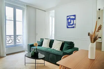 Coin salon dans l'établissement Luxury apartment 1min from Eiffel Tower
