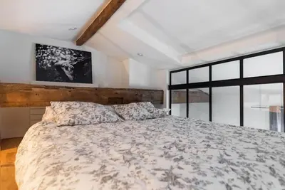 Un ou plusieurs lits dans un hébergement de l'établissement Appartement type loft - 40m² Marais