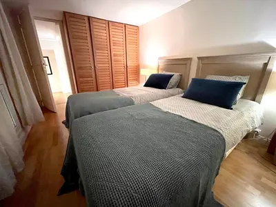 Un ou plusieurs lits dans un hébergement de l'établissement L'appartement Pierre Charron C