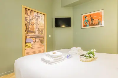 Un ou plusieurs lits dans un hébergement de l'établissement Charming Apartment - 1BR - Guy Moquet