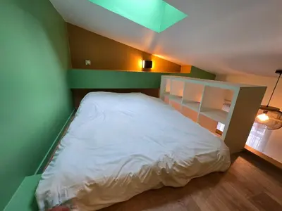 Un ou plusieurs lits dans un hébergement de l'établissement 3D- Studio tout équipé avec cuisine 10 mins de Paris