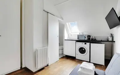 Cuisine ou kitchenette dans l'établissement Amsterdam 12 - Charmant studio à Saint-Lazare