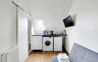 Cuisine ou kitchenette dans l'établissement Amsterdam 12 - Charmant studio à Saint-Lazare