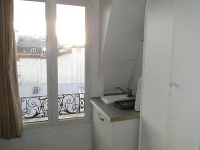 Cuisine ou kitchenette dans l'établissement STUDIO ST MICHEL
