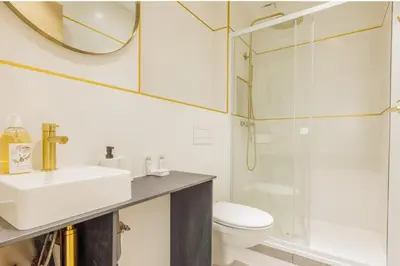Salle de bains dans l'établissement Appartement Moderne 1BR-4P - Guy Moquet