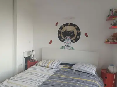 Un ou plusieurs lits dans un hébergement de l'établissement Appartement Street-art