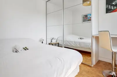 Un ou plusieurs lits dans un hébergement de l'établissement Appartement Garibaldi - Welkeys