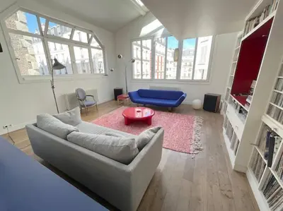 Coin salon dans l'établissement Magnifique Loft Epinette Baron CityCosy
