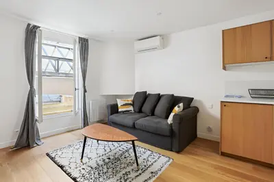 Coin salon dans l'établissement 333 Suite Chou - Superbe Appartement à Paris.