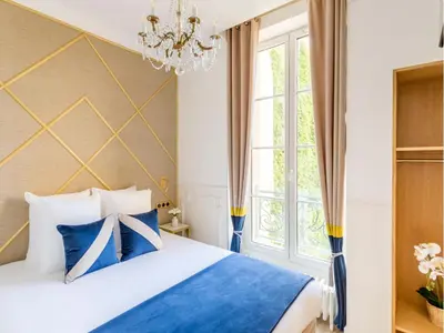 Un ou plusieurs lits dans un hébergement de l'établissement Merveil - Luxury Suite - Tour Eiffel - Bac I