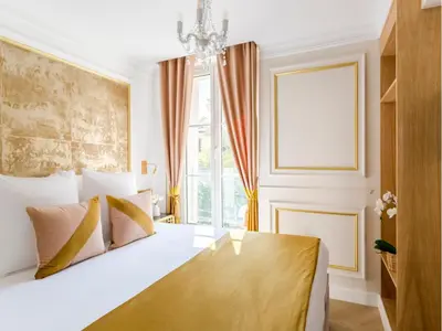 Un ou plusieurs lits dans un hébergement de l'établissement Merveil - Luxury Suite - Tour Eiffel - Bac II