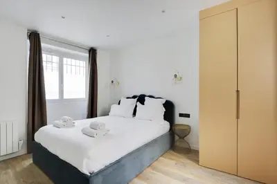 Un ou plusieurs lits dans un hébergement de l'établissement Pick A Flat's Apartment in Montorgueil - Rue Notre Dame de Recouvrance