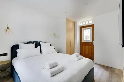 Un ou plusieurs lits dans un hébergement de l'établissement Pick A Flat's Apartment in Montorgueil - Rue Notre Dame de Recouvrance