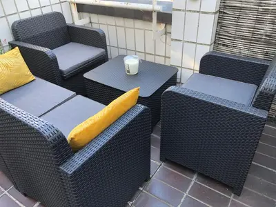 Coin salon dans l'établissement Nid de rêve, vue imprenable sur Paris et terrasse 10m2