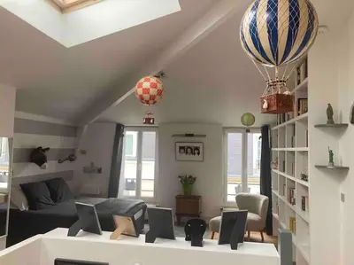 Coin salon dans l'établissement Jolie maison de ville à 5 minutes de Paris pour 5 voyageurs parking inclus