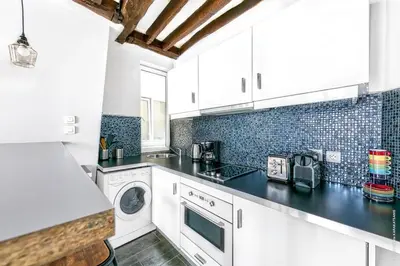 Cuisine ou kitchenette dans l'établissement Pompidou - Archives 1bdr