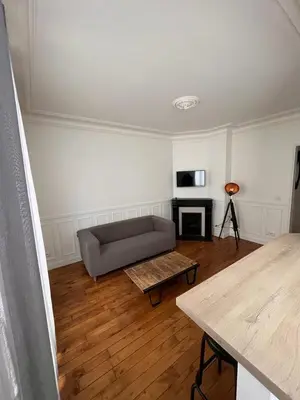 Coin salon dans l'établissement Cosy appartement paris à deux pas