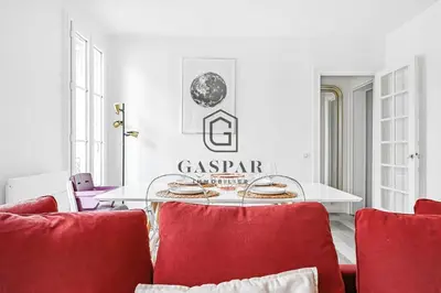 Coin salon dans l'établissement GASPAR - Appartement 2 Chambres 4 personnes Dernier étage 75 m2