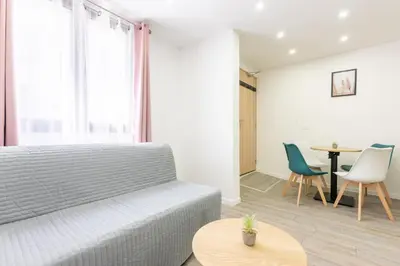 Coin salon dans l'établissement Nets Inn apartments - Robida