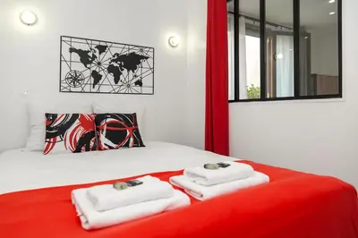 Un ou plusieurs lits dans un hébergement de l'établissement Nets Inn apartments - Robida