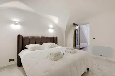 Un ou plusieurs lits dans un hébergement de l'établissement Beautiful 1BR6P - Montorgueil RDC