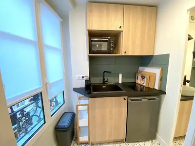 Cuisine ou kitchenette dans l'établissement Le studio Letac