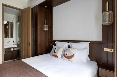 Un ou plusieurs lits dans un hébergement de l'établissement HIGHSTAY - Luxury Serviced Apartments - North Marais 2